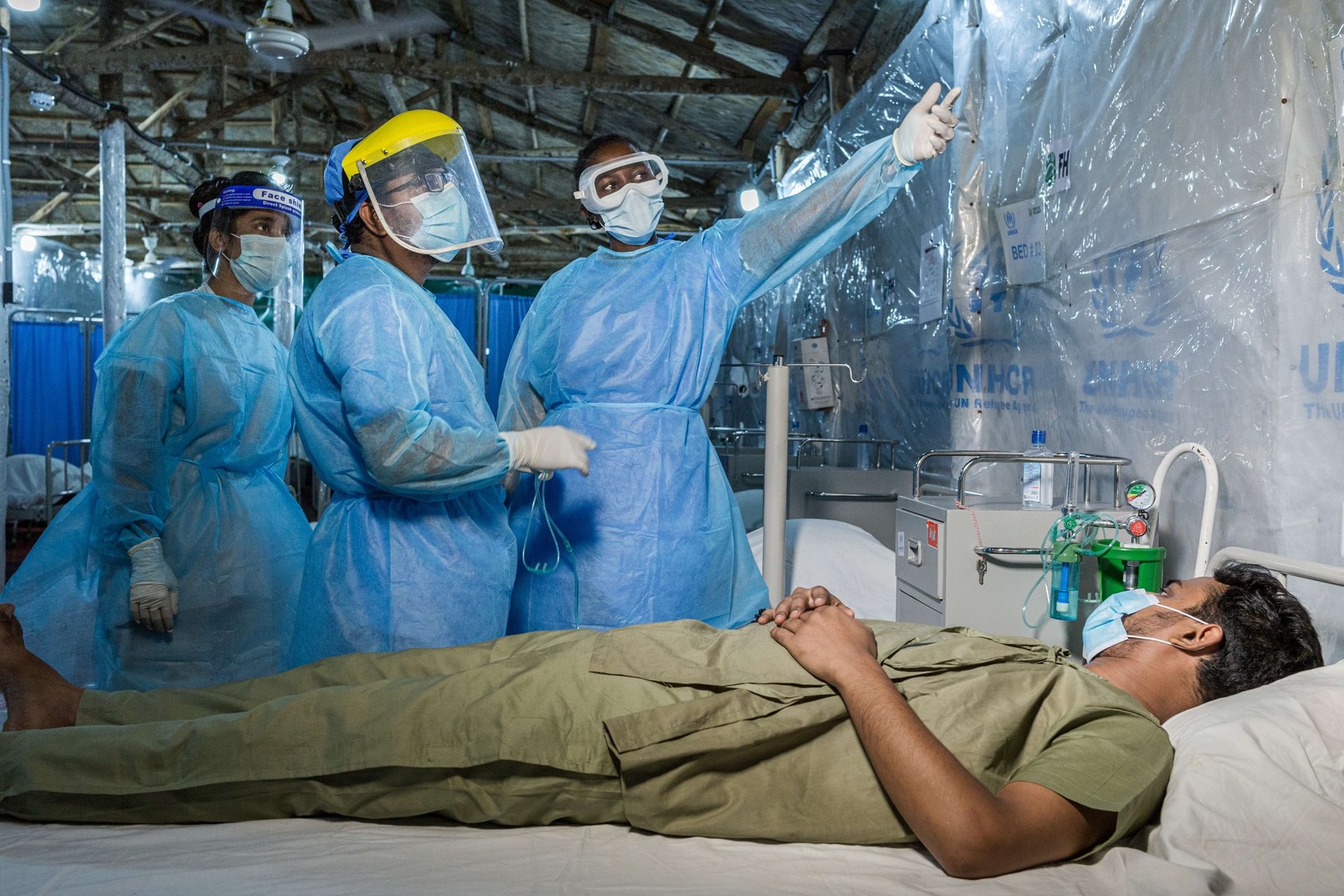 COVID-19 treatment center, a patient and the medical staff